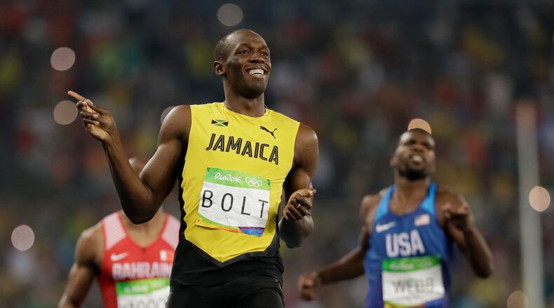 Jamaica's Usain Bolt wins a men's 200-meter semifinal during the athletics competitions of the 2016 Summer Olympics at the Olympic stadium in Rio de Janeiro, Brazil, Wednesday, Aug. 17, 2016. (AP Photo/David J. Phillip)