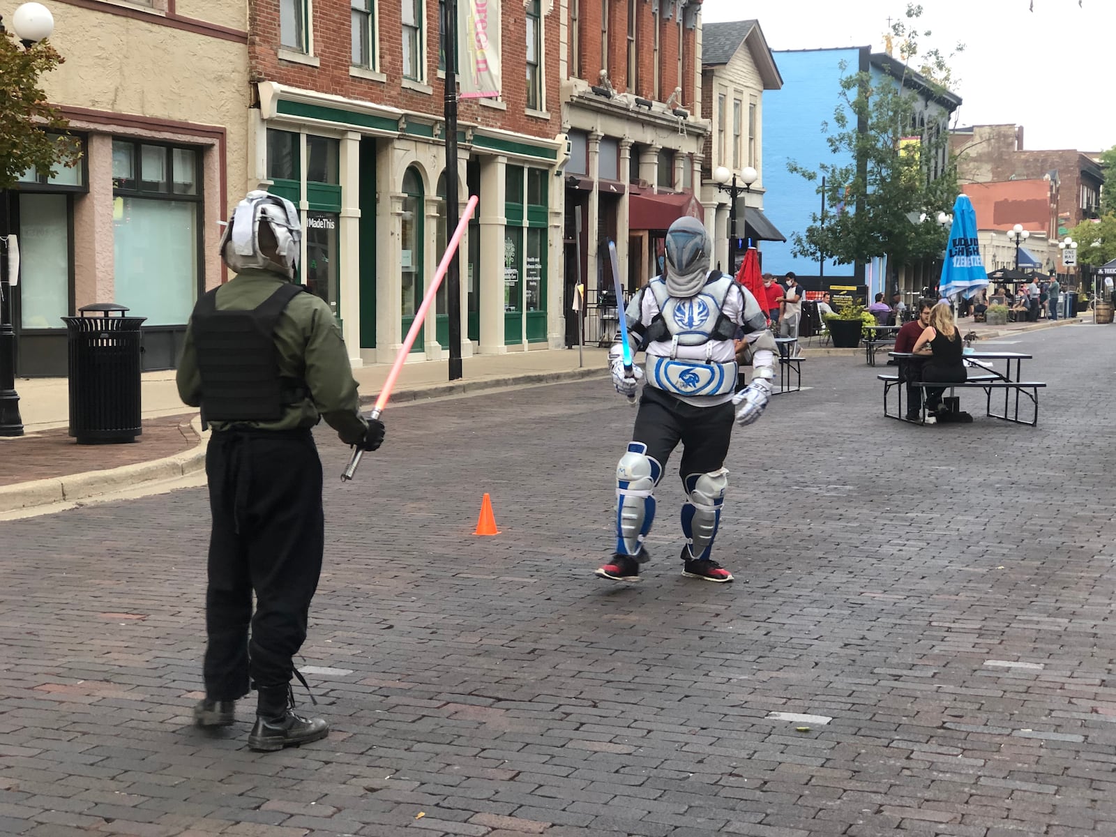 Light saber battles were among the entertainment provided at Out on 5th. CORNELIUS FROLIK / STAFF