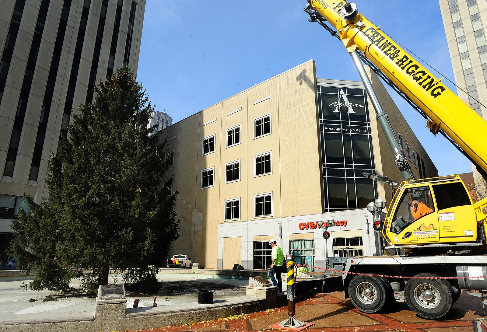 The tree for the 49th annual Dayton Holiday Festival arrived at Courthouse Square in downtown Dayton on Wednesday, Nov. 10, 2021. MARSHALL GORBY\STAFF