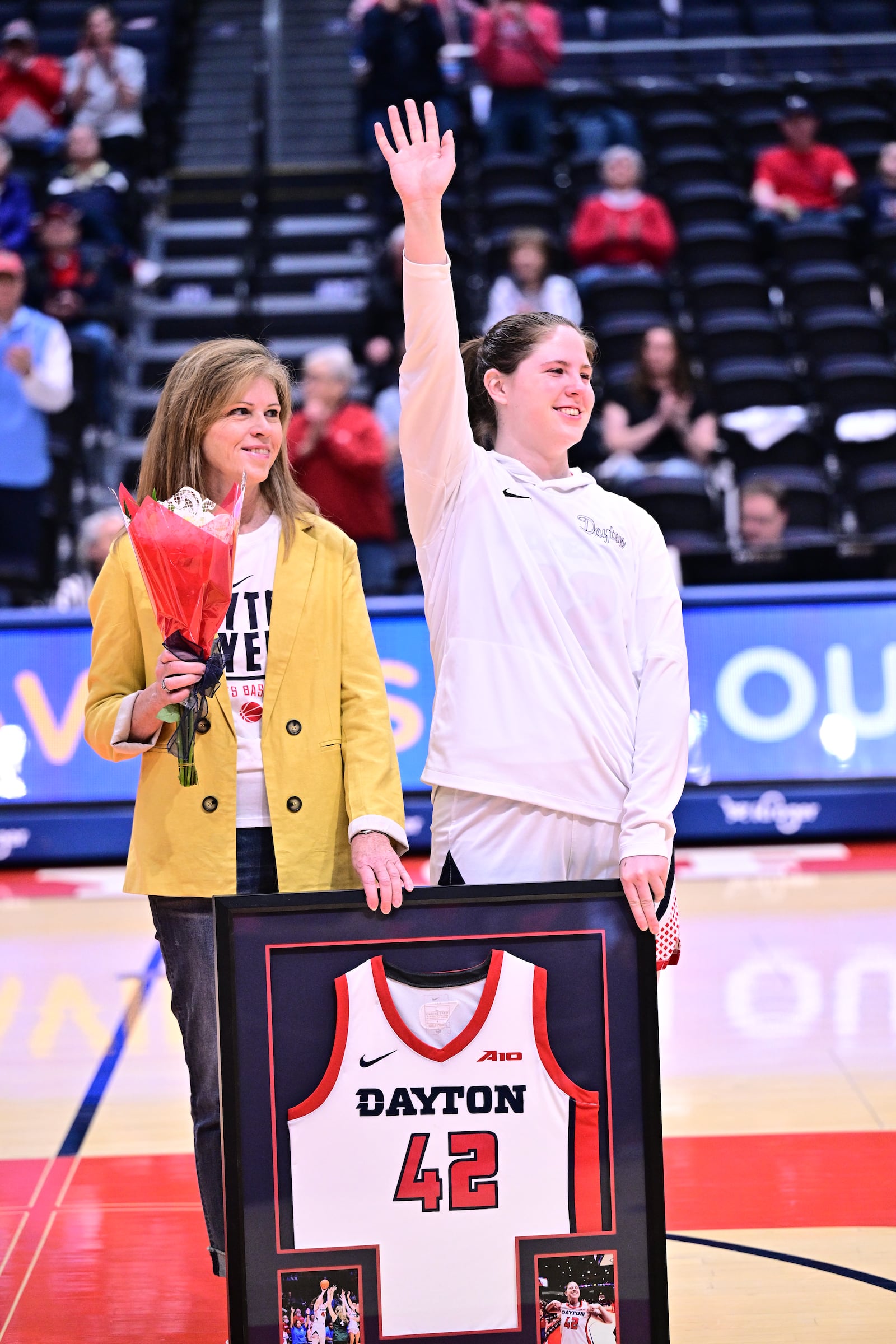 University of Dayton women's basketball player Eleanor Monyek waves to the crowd on Senior Day on Saturday, Feb. 28, 2026 at UD Arena. ERIK SCHELKUN / CONTRIBUTED PHOTO