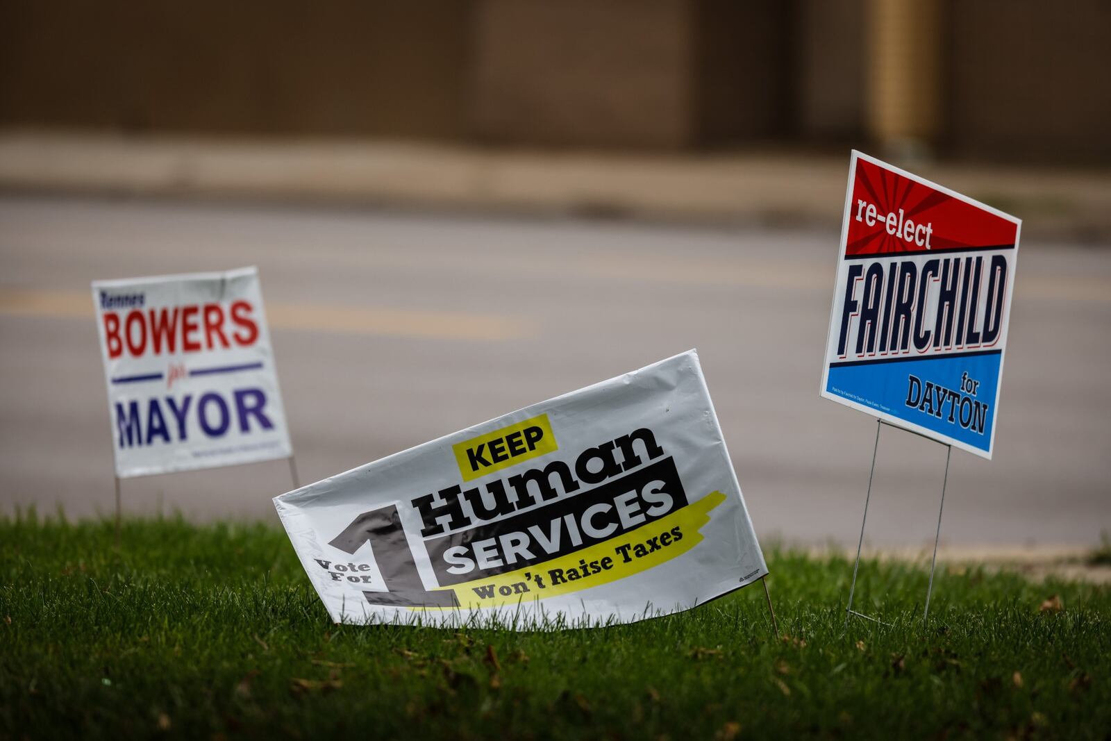 Political sign are scattered about Wayne Ave. in Dayton. JIM NOELKER/STAFF