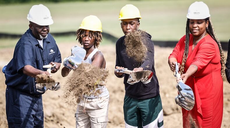 From left, Jefferson Twp. building and grounds supervisor Rod Dixon, Jefferson High students Christian Colling and Danial Kana and Jefferson Twp. board president Shaunece Gillespie break ground on the new agriculture center Tuesday morning June 25. 2024. JIM NOELKER/STAFF