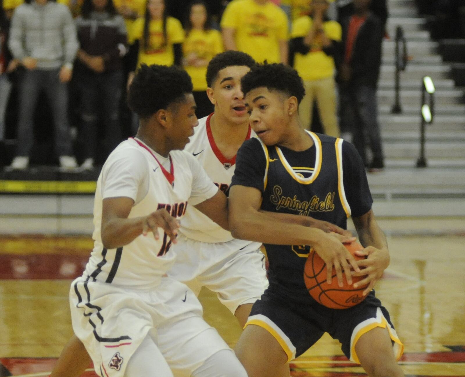 Springfield’s JaJuan Rodgers is tied up. Springfield defeated host Wayne 56-54 in a boys high school basketball game on Friday, Feb. 10, 2017. MARC PENDLETON / STAFF
