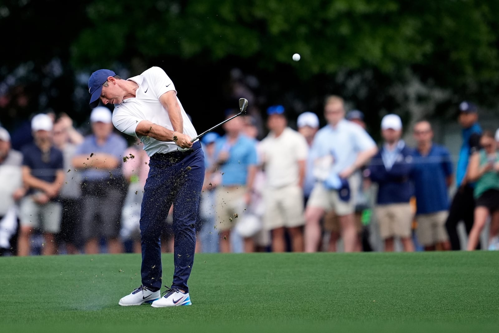 Rory McIlroy, of Northern Ireland, hits from the fairway on the first hole during a practice round for the PGA Championship golf tournament at the Quail Hollow Club, Tuesday, May 13, 2025, in Charlotte, N.C. (AP Photo/George Walker IV)