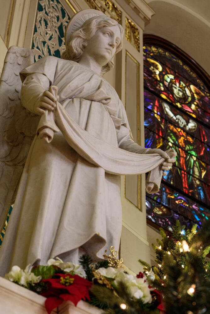 PHOTOS: Christmas Eve morning at St. Joseph Catholic Church in downtown Dayton