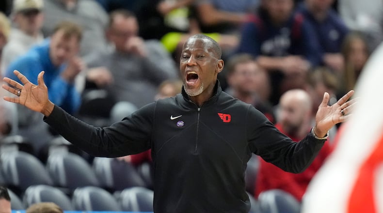 Dayton head coach Anthony Grant shouts during the first half of a second-round college basketball game against Arizona in the NCAA Tournament in Salt Lake City, Saturday, March 23, 2024. (AP Photo/Rick Bowmer)