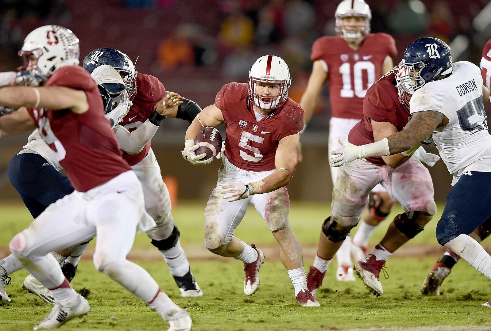PALO ALTO, CA - NOVEMBER 26: Christian McCaffrey #5 of the Stanford Cardinal carries the ball against the Rice Owls in the third quarter of their NCAA football game at Stanford Stadium on November 26, 2016 in Palo Alto, California. (Photo by Thearon W. Henderson/Getty Images)