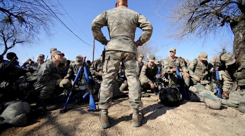 Master Sergeant Tim Burton, Military Training Instructor, 737 Training Support Squadron, prepares his basic trainees for gas mask training at the Basic Expeditionary Airman Skills Training program in Medina AB, San Antonio, Texas, in this 2009 Air Force photo.