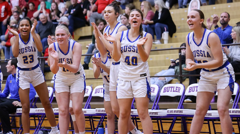 Russia junior forward Celeste Borchers and Cedarville's Katelyn Reed collide during a Division VII regional final on Saturday, March 7 at Vandalia-Butler's Student Activity Center. BRYANT BILLING / STAFF