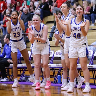 Russia junior forward Celeste Borchers and Cedarville's Katelyn Reed collide during a Division VII regional final on Saturday, March 7 at Vandalia-Butler's Student Activity Center. BRYANT BILLING / STAFF