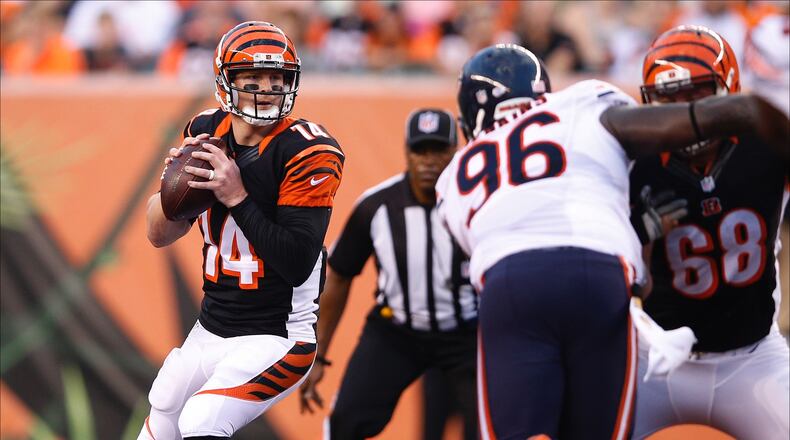 CINCINNATI, OH - AUGUST 29: Andy Dalton #14 of the Cincinnati Bengals looks to pass in the first quarter of a preseason game against the Chicago Bears at Paul Brown Stadium on August 29, 2015 in Cincinnati, Ohio. (Photo by Joe Robbins/Getty Images)