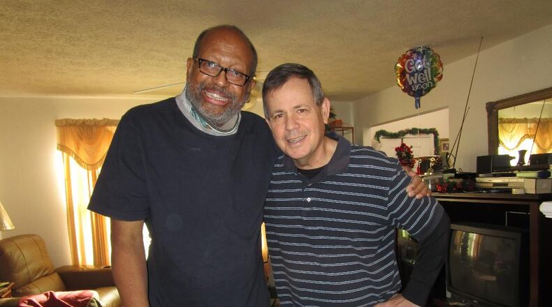 Former University of Dayton teammates Terry Ross (left) and Doug Harris. CONTRIBUTED