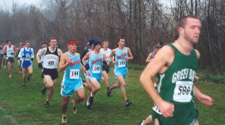 The Dayton cross country team races in Chapel Blue uniforms in 2003. Contributed photo