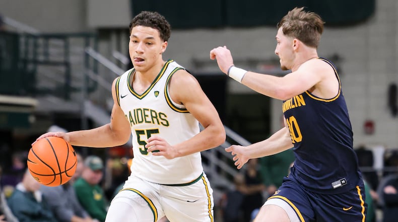 Wright State freshman guard Michael Cooper shoots during an 86-37 win over Franklin College 86-37 in a season opener on Monday, Nov. 3 at Ervin J. Nutter Center in Fairborn. BRYANT BILLING/STAFF
