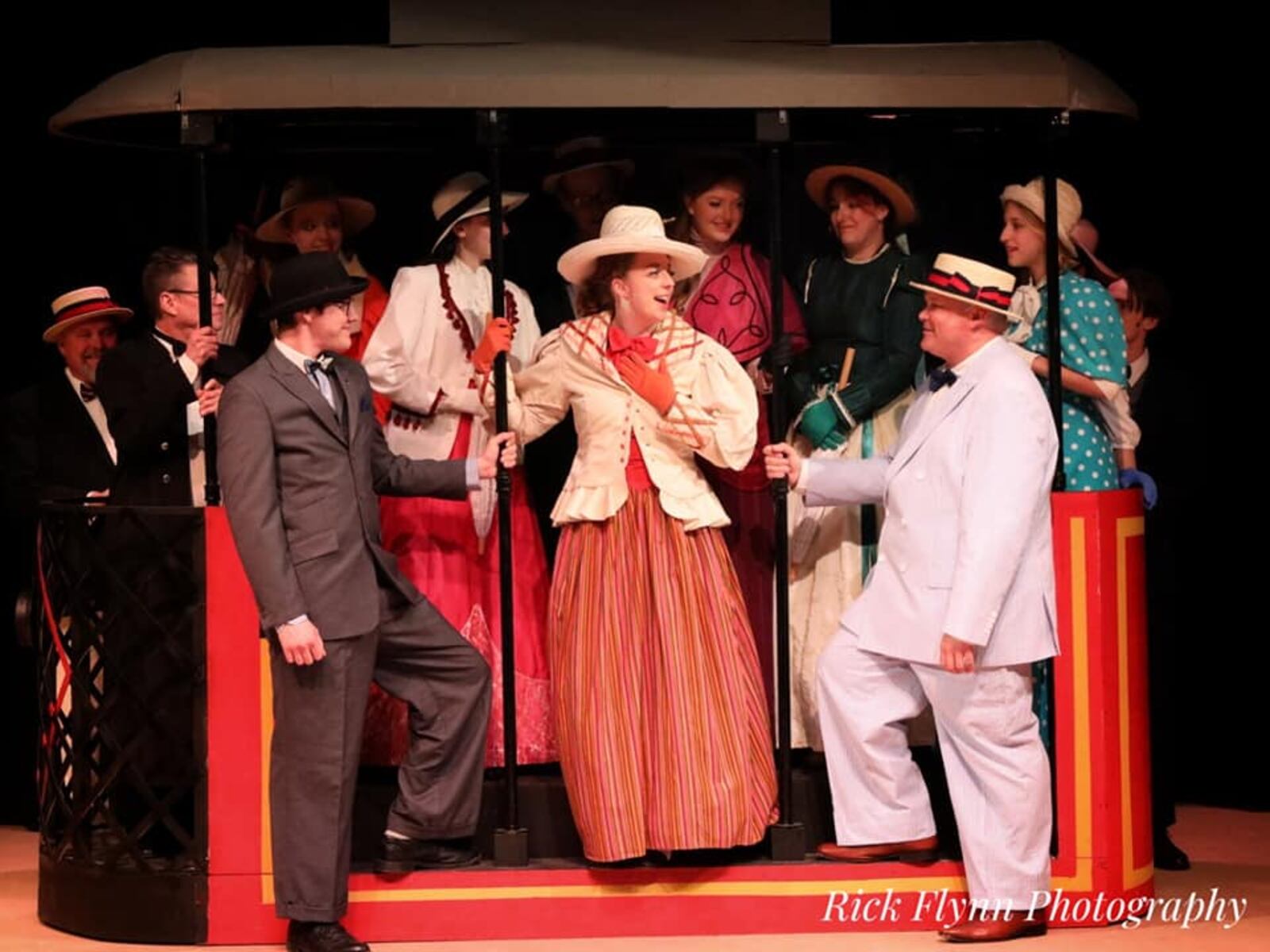 Alicia Wagner (center as Esther Smith) and the cast of Dayton Playhouse's production of "Meet Me in St. Louis," continuing through May 21. PHOTO BY RICK FLYNN PHOTOGRAPHY