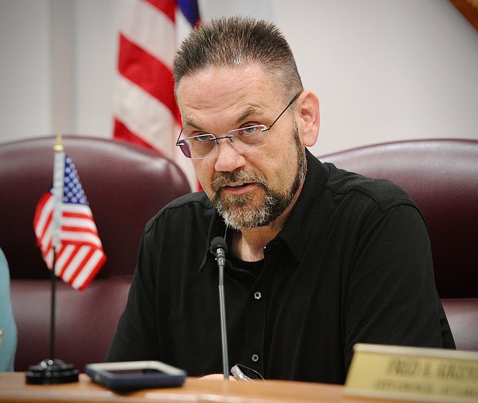 Huber Heights Mayor Jeff Gore speaks during a special meeting called Monday, May 20, 2024, during which the city council went into executive session to discuss the weekend OVI arrest of City Manager Rick Dzik. The council took no action but said the matter was under review. MARSHALL GORBY/STAFF