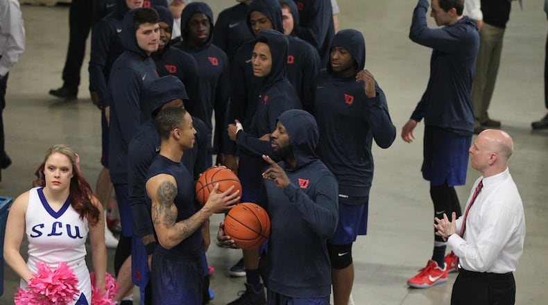 Dayton's Kyle Davis and Scoochie Smith prepare to lead the Flyers onto the court for warmups at Chaifetz Arena on Tuesday, Feb. 14, 2017, in St. Louis.
