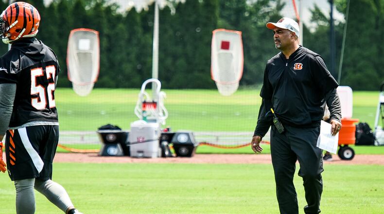 The Cincinnati Bengals’ defensive coordinator Teryl Austin oversees the defense during organized team activities Tuesday, May 22 at the practice facility near Paul Brown Stadium in Cincinnati. NICK GRAHAM/STAFF
