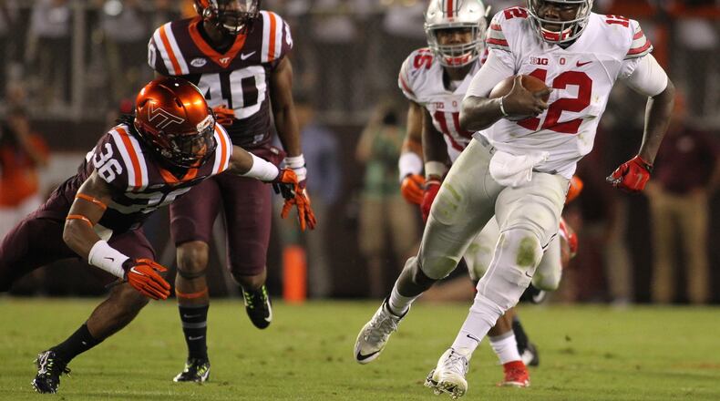 Ohio State’s Cardale Jones carries the ball against Virginia Tech on Monday, Sept. 7, 2015, at Lane Stadium in Blacksburg, Va. David Jablonski/Staff