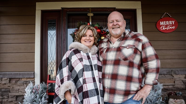 Kim and Tim Bilbrey have been organizing a gift giveaway to benefit children in the Dayton area for more than 10 years. JIM NOELKER/STAFF