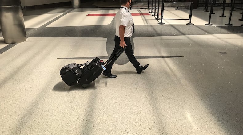 Nationally and locally airports have taken an economic hit from COVID-19 including Dayton International Airport. Two airlines that fly out of Dayton International Airport have announced plans to lay off a total of nearly 280 workers in what is shaping up to be the bleakest time for aviation in perhaps decades.JIM NOELKER/STAFF