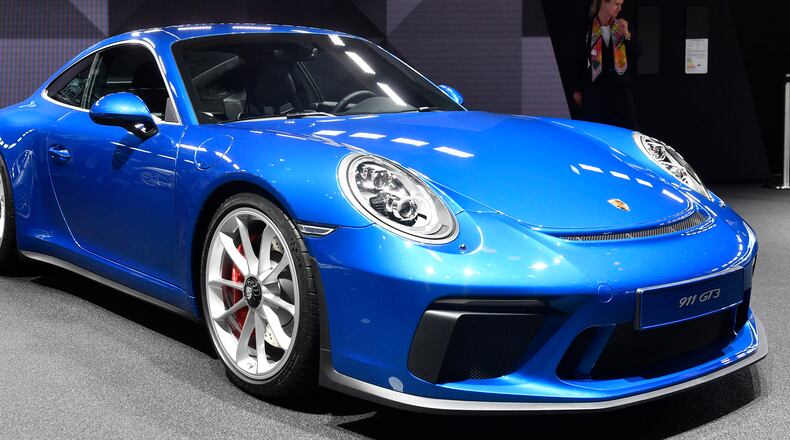A Porsche 911 GT3 with Touring Package is on display during an event of German car maker Volkswagen. FILE