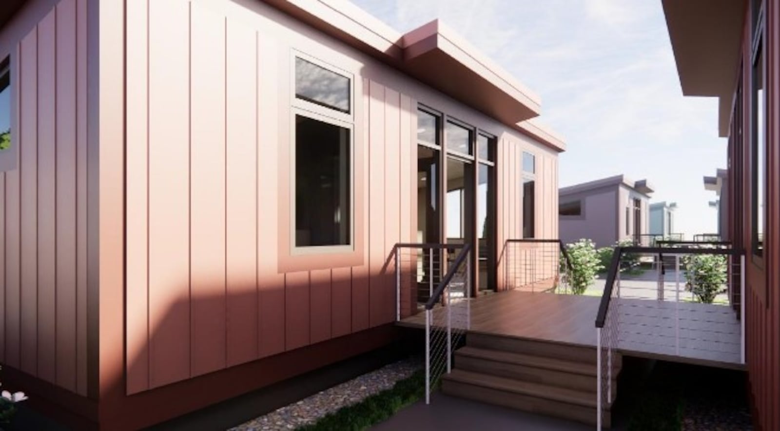 A conceptual rendering of a tiny home featuring 500 square feet of space in the proposed Beacon Place Village in northeast Dayton. Pairs of units would be connected by shared decks. CONTRIBUTED