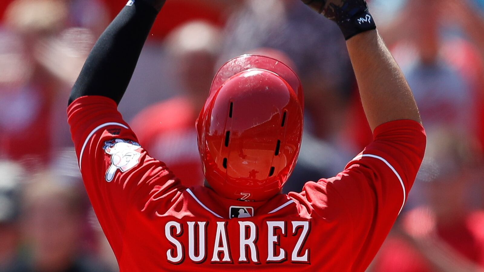 Cincinnati Reds' Eugenio Suarez celebrates after hitting a solo home run off San Diego Padres relief pitcher Brad Hand in the seventh inning Thursday, Aug. 10, 2017, in Cincinnati.