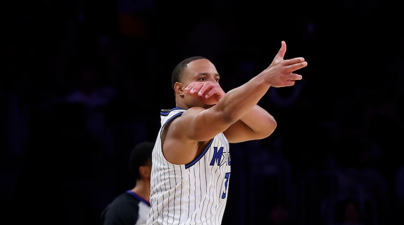 Orlando Magic guard Desmond Bane (3) reacts after shooting a 3-point shot during the second half of an NBA basketball game against the Los Angeles Lakers Tuesday, Feb. 24, 2026, in Los Angeles. (AP Photo/Caroline Brehman)