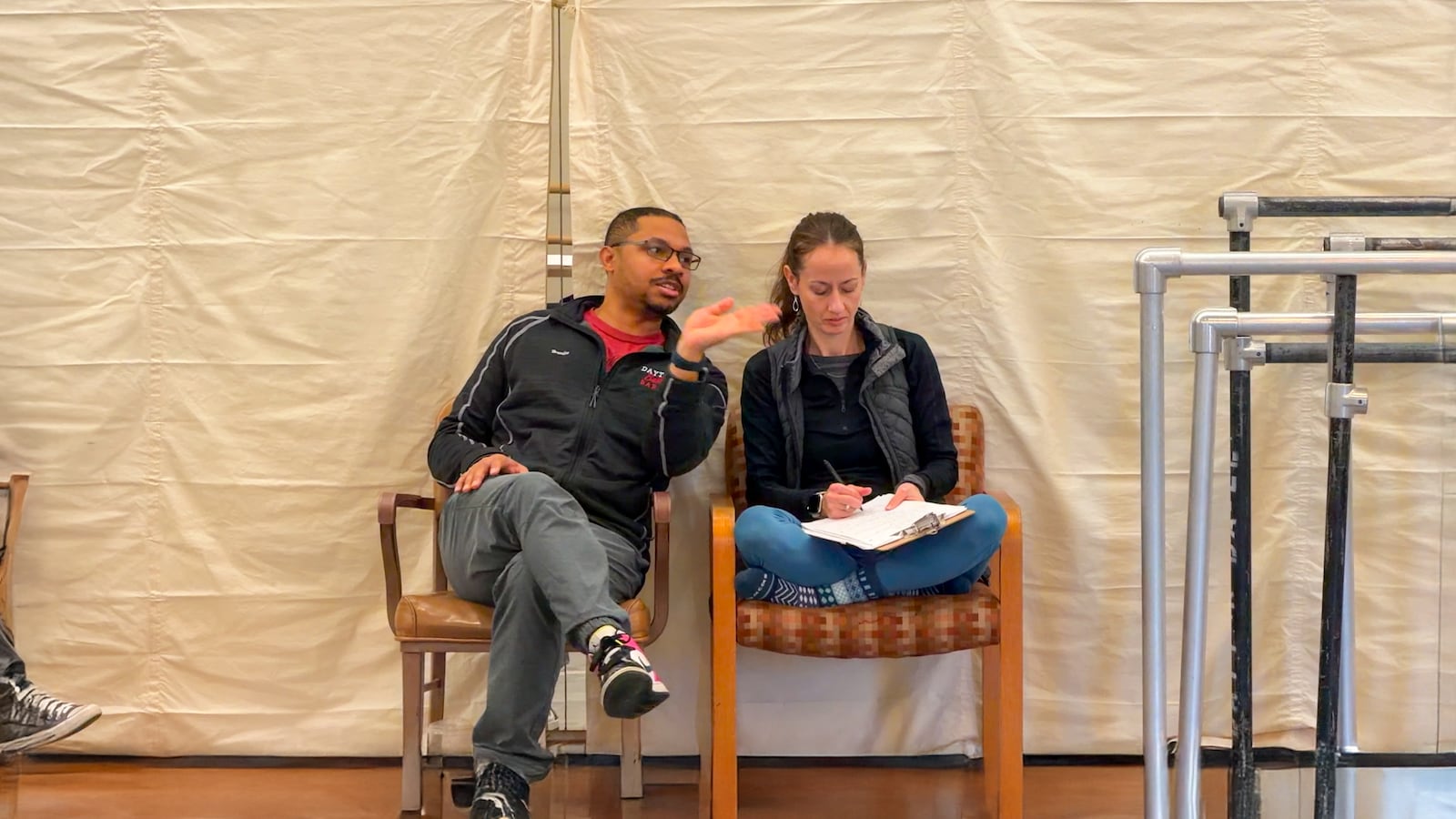 Dayton Ballet Artistic Director Brandon Ragland speaks with Rachel Cahayla Wynne, Dayton Ballet rehearsal director and studio company manager. DAVID SHERMAN/STAF