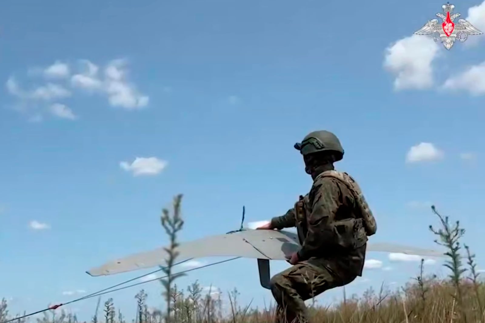 FILE - In this photo taken from video distributed by Russian Defense Ministry Press Service on July 17, 2025, a Russian serviceman operates a "Supercam" drone in an undisclosed location in Ukraine. (Russian Defense Ministry Press Service via AP, File)