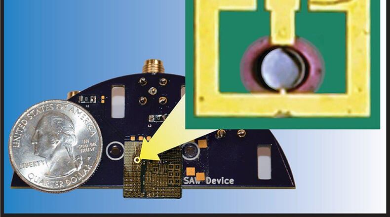 Researchers from the Air Force Research Laboratory Materials and Manufacturing Directorate, along with Northeastern University, developed an ultra-compact antenna smaller than a flea. This innovation could help miniaturize or add greater functionality to many devices used by the warfighter. (U.S. Air Force photo/Michael McConney)