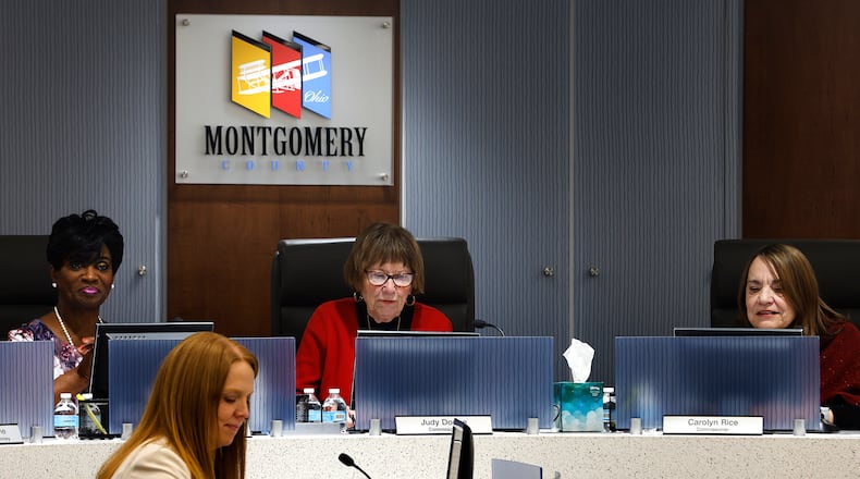 Newly elected Montgomery County commissioner Mary McDonald, left, attends her first commission meeting with, commissioners Judy Dodge, middle, and Carolyn Rice, Tuesday, Jan. 7, 2025. MARSHALL GORBY\STAFF