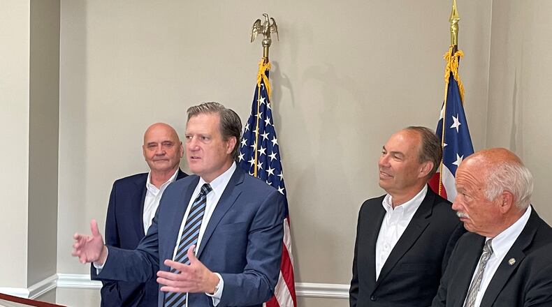 U.S. and Ohio lawmakers met Wednesday to discuss coordinating state and federal policy, including on supporting Wright-Patterson Air Force Base and related development. The lawmakers included, from left, state Rep. Tom Young, U.S. Rep. Mike Turner, state Sen. Bob Peterson and state Sen. Bob Hackett.