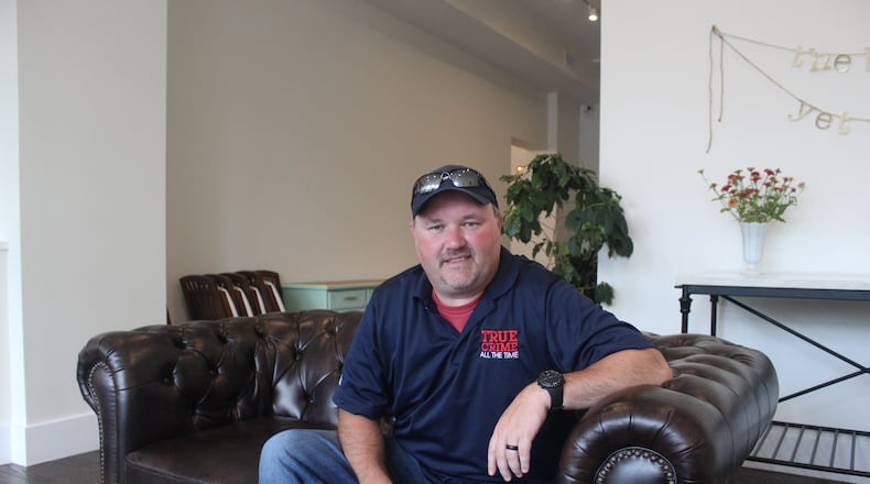 Mike Ferguson of Miamisburg is the co-host “True Crime All The Time.” His photo was taken at Reza’s Downtown.