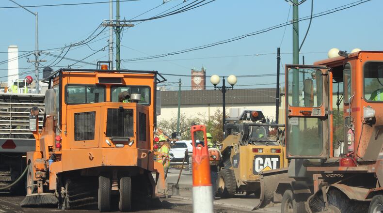 Construction crews work to resurface Wayne Avenue in the Oregon Historic District. CORNELIUS FROLIK / STAFF