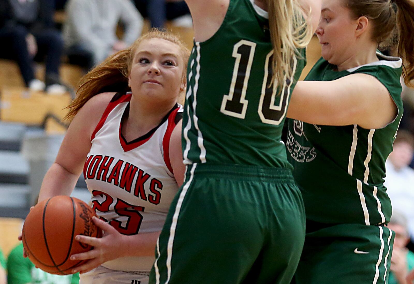 Madison forward Kelli Bush is covered by Bethel’s Alaina Hawthorne (10) and Becky Schwieterman during their Division III sectional game at Franklin Monroe on Saturday. CONTRIBUTED PHOTO BY E.L. HUBBARD