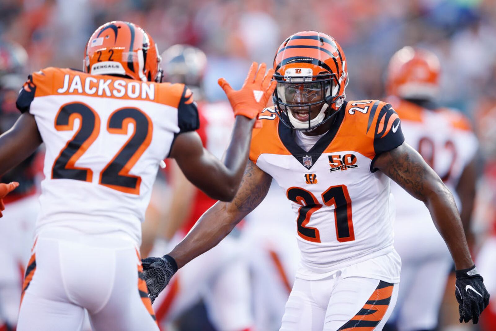 CINCINNATI, OH - AUGUST 11: Darqueze Dennard #21 and William Jackson III #22 of the Cincinnati Bengals celebrate in the first quarter of a preseason game against the Tampa Bay Buccaneers at Paul Brown Stadium on August 11, 2017 in Cincinnati, Ohio. (Photo by Joe Robbins/Getty Images)