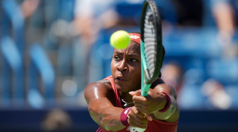 FILE - Coco Gauff returns a shot to Karolina Muchova, of the Czech Republic, during the women's singles final of the Western & Southern Open tennis tournament, Sunday, Aug. 20, 2023, in Mason, Ohio. Gauff is one of the women to watch at the U.S. Open, which begins at Flushing Meadows on Aug. 28.(AP Photo/Aaron Doster, File)