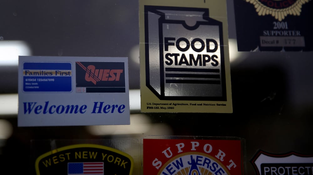 Asupermarket displays stickers indicating they accept food stamps. (AP Photo/Seth Wenig, File)