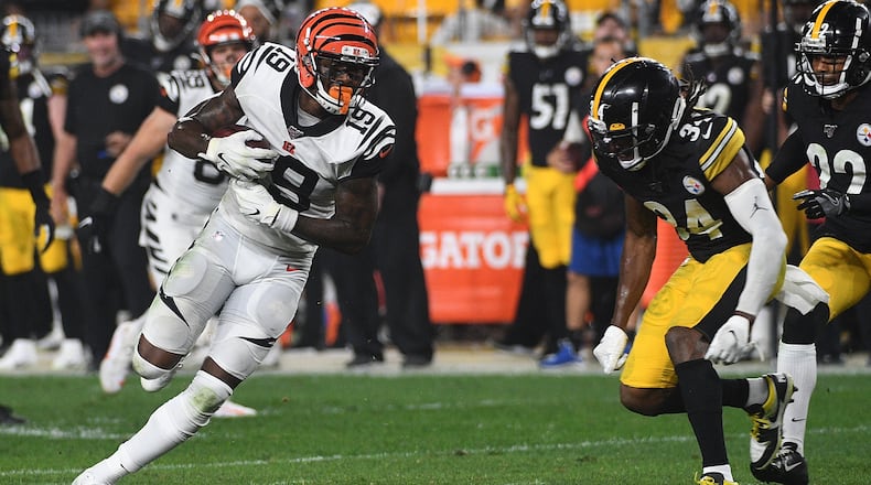 PITTSBURGH, PA - SEPTEMBER 30: Auden Tate #19 of the Cincinnati Bengals runs upfield after a catch as Terrell Edmunds #34 of the Pittsburgh Steelers defends in the second half during the game at Heinz Field on September 30, 2019 in Pittsburgh, Pennsylvania. (Photo by Justin Berl/Getty Images)