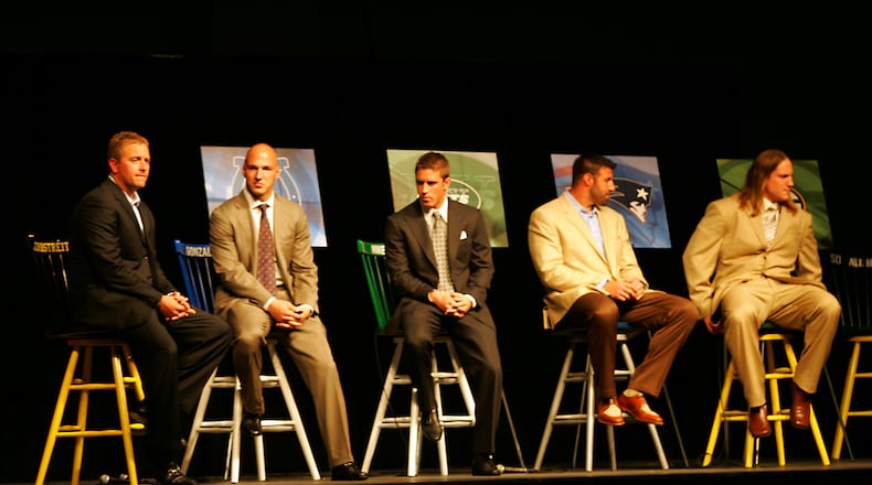 L-R: Centerville Alum, OSU QB and ESPN college football analyst Kirk Herbstreit, former OSU player and current Indianapolis Colt Anthony Gonzalez, former Centerville, OSU, and current NY Jet kicker Mike Nugent, former OSU and current New England Patriot Mike Vrabel, and former Centerville, OSU and current Green Bay Packer A.J. Hawk  sit onstage during the Sonny Unger Foundation Program at the Dayton Convention Center Wednesday evening. Photo by Jim Witmer