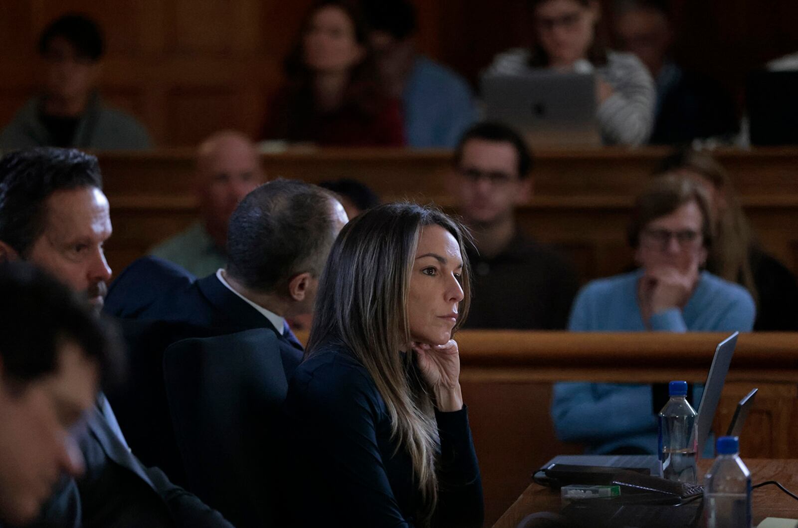 Karen Read listens to the testimony of digital forensics analyst Shanon Burgess during her retrial in the Norfolk Superior Court, Monday, May 19, 2025, in Dedham, Mass. (Pat Greenhouse/The Boston Globe via AP, Pool)
