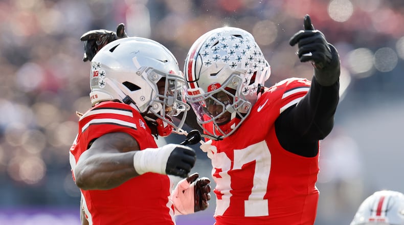 Ohio State linebacker Arvell Reese, left, celebrates his sack against Penn State with teammate defensive lineman Kenyatta Jackson during the second half of an NCAA college football game, Saturday, Nov. 1, 2025, in Columbus, Ohio. (AP Photo/Jay LaPrete)