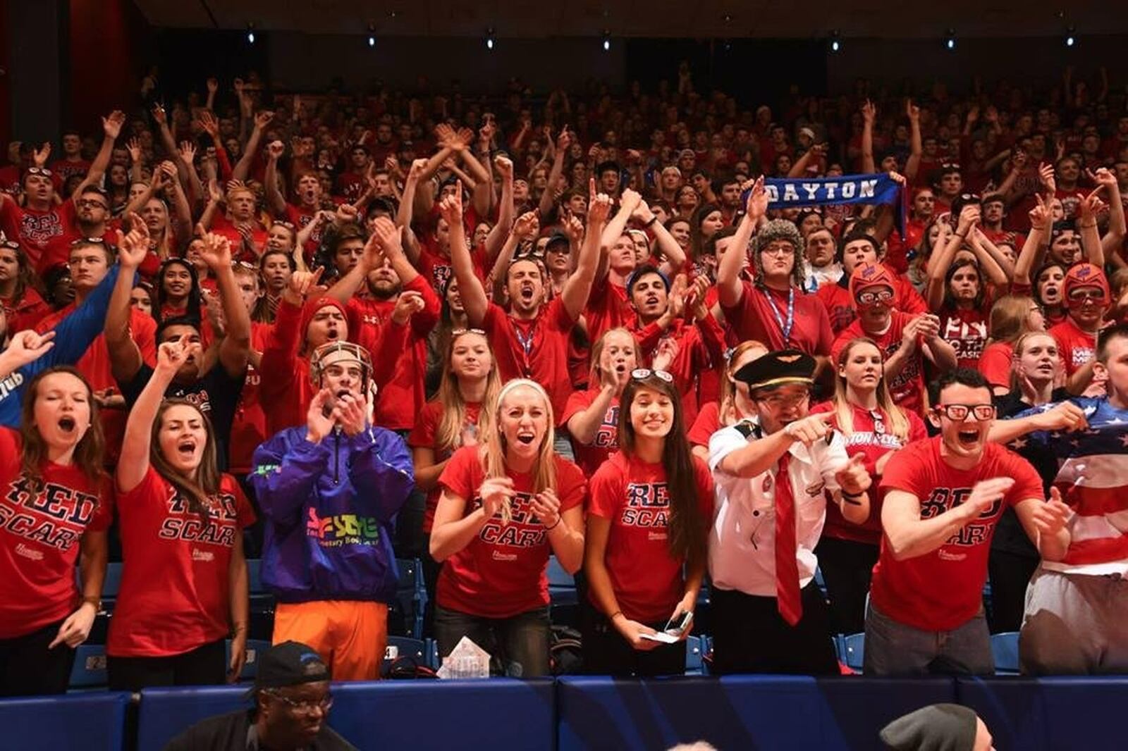 Rowdy members of the Red Scare, a student group that attends sports games, are the “pulse of UD Arena.” Contributed photo