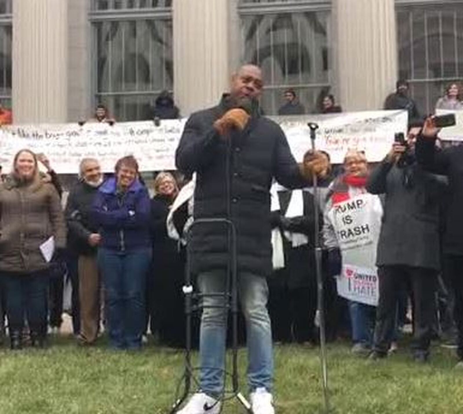 Actor and comedian Dave Chappelle spoke to the crowd in Dayton to say he, too, is standing with refugees impacted by President Trump’s executive order. MALIK PERKINS / STAFF