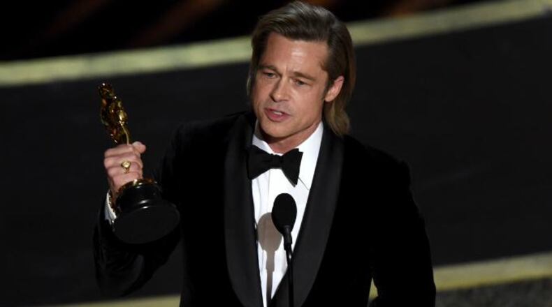 Brad Pitt accepts the award for best performance by an actor in a supporting role for "Once Upon a Time in Hollywood" at the Oscars on Sunday, Feb. 9, 2020, at the Dolby Theatre in Los Angeles.