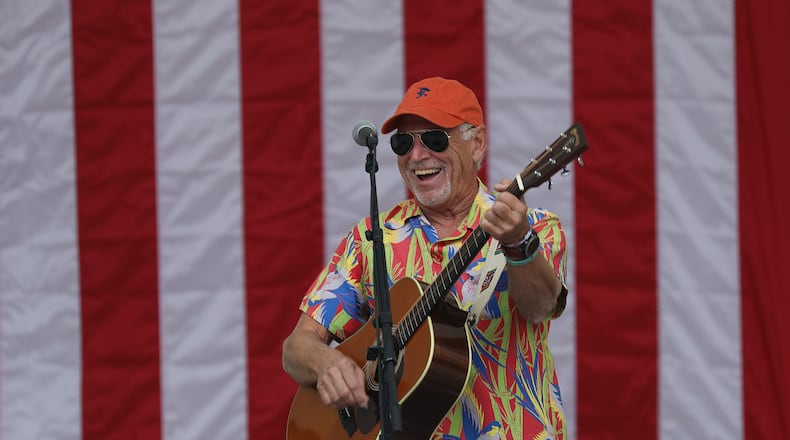 WEST PALM BEACH, FLORIDA - NOVEMBER 03: Jimmy Buffett plays a song as he performs at a Get Out the Vote rally for U.S. Senator Bill Nelson (D-FL) and Florida Democratic governor candidate Andrew Gillum at the Meyer Amphitheatre on November 03, 2018 in West Palm Beach, Florida. Mr. Buffett was encouraging people to vote for Sen. Nelson and Mayor Gillum who are in tight races against their Republican opponents. (Photo by Joe Raedle/Getty Images)