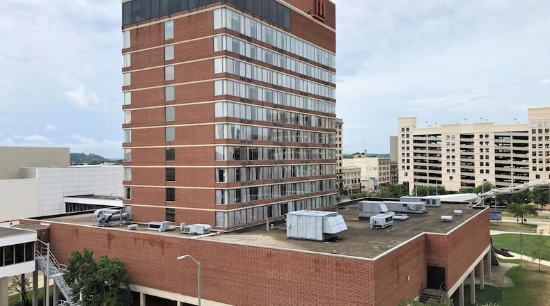 The Radisson Hotel, the former Crowne Plaza, at 33 E. Fifth St., across the street from the Dayton Convention Center. CORNELIUS FROLIK / STAFF