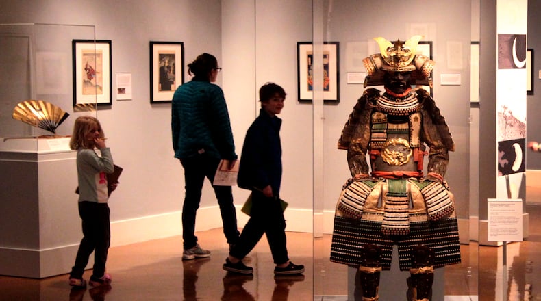 “Samurai, Ghosts and Lovers: Yoshitoshi’s Complete 100 Aspects of the Moon,” in on display at the Dayton Art Institute. The exhibition is a rare look at all 100 works in Tsukioka Yoshitoshi’s epic series of Japanese woodblock prints. A selection of works from the DAI’s Japanese collection, as well as local and national loans, including rare samurai suits, are also on display. The exhibition will be on view until May 3. LISA POWELL / STAFF